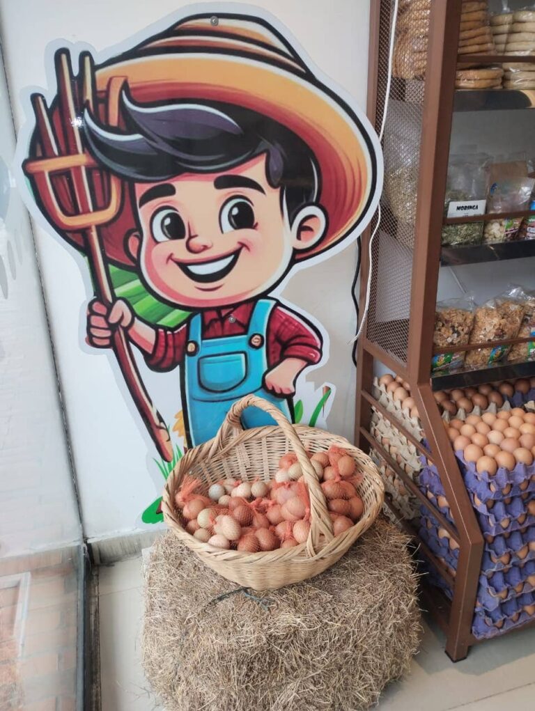 Imagen del logotipo del Granjero con una canasta de huevos